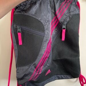 Barely used Adidas drawstring backpack with external pockets